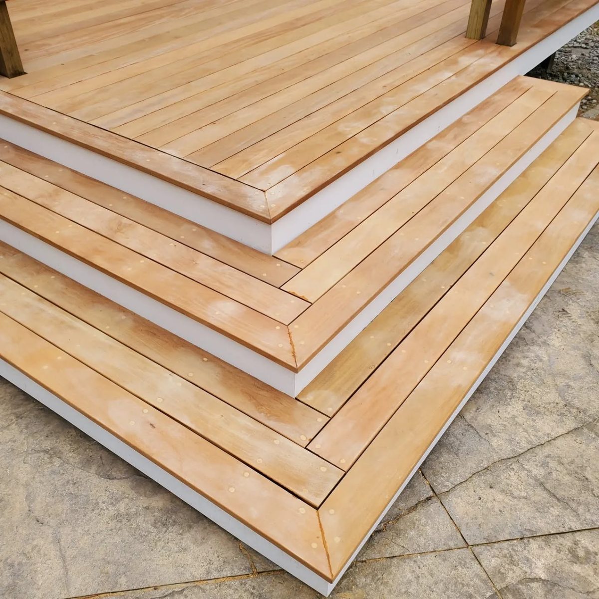 Cedar deck with steps and railing, built in Western Maine