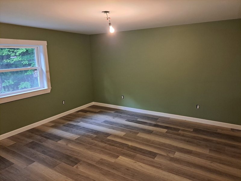 Finished basement with new flooring